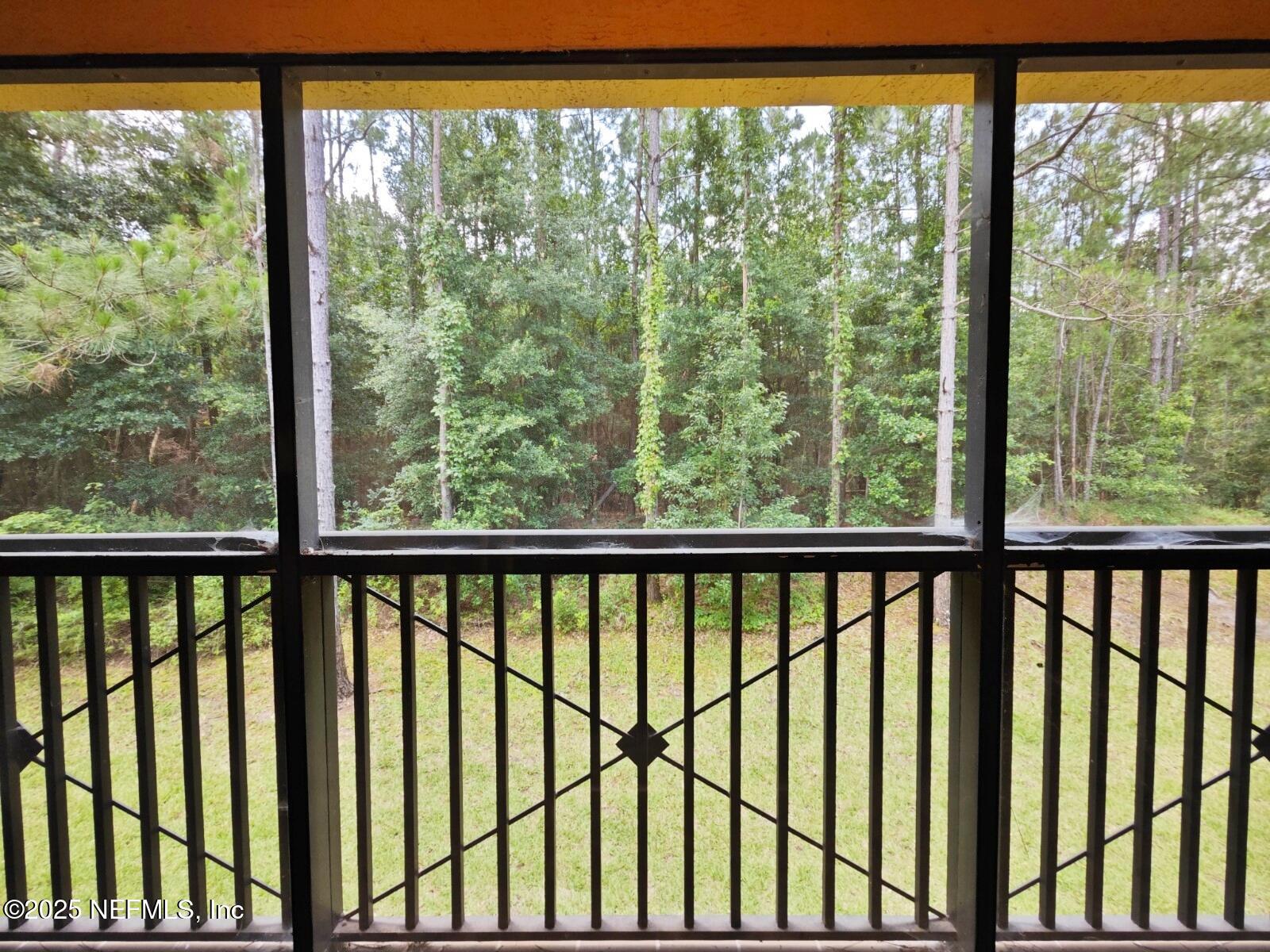 9745 Touchton Road, Unit 723 Jacksonville, FL 32246 - Photo 7 of 18 a view of outdoor with green trees