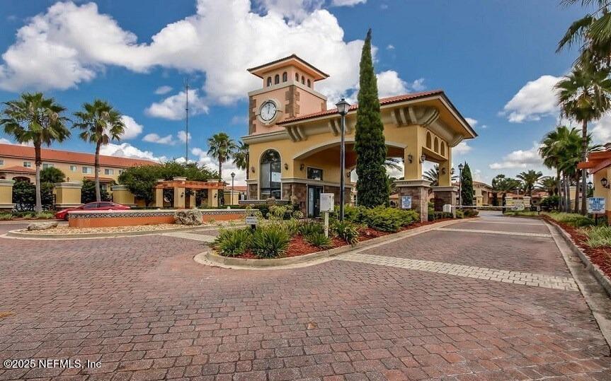 9745 Touchton Road, Unit 723 Jacksonville, FL 32246 - Photo 10 of 18 a view of a street with houses
