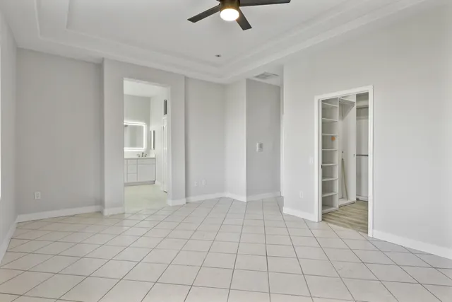a bathroom with a shower and a sink