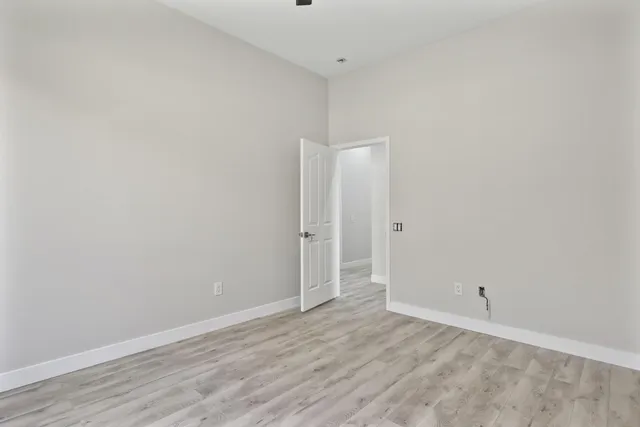 a bathroom with a sink and cabinets