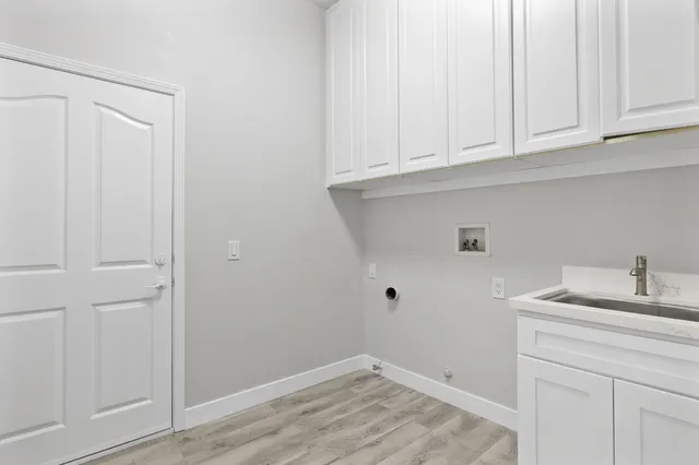 a view of a swimming pool with an outdoor seating