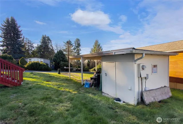 a view of a backyard with a barn