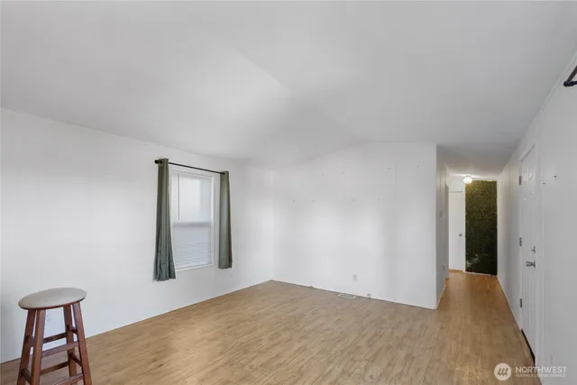 a view of an empty room and window