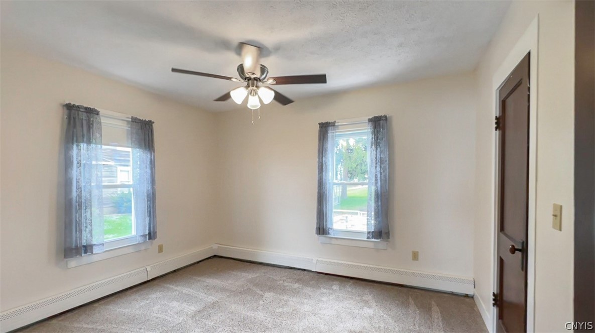 7195 Lakeshore Road Cicero, NY 13039 - Photo 20 of 46 First Floor Bedroom, Hardwood Floors under carpet!