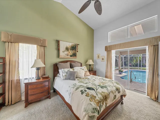 a kitchen with stainless steel appliances kitchen island granite countertop a sink and cabinets