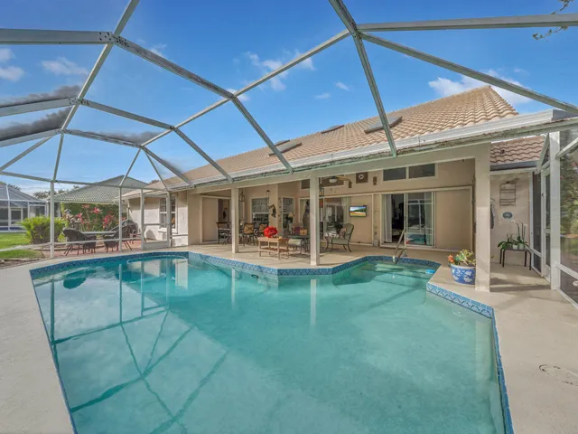 a kitchen with stainless steel appliances a refrigerator sink and cabinets