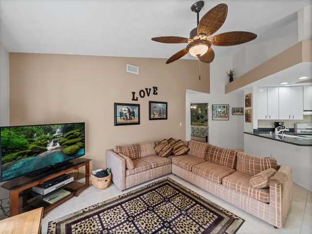 a view of a storage and utility room with washer and dryer