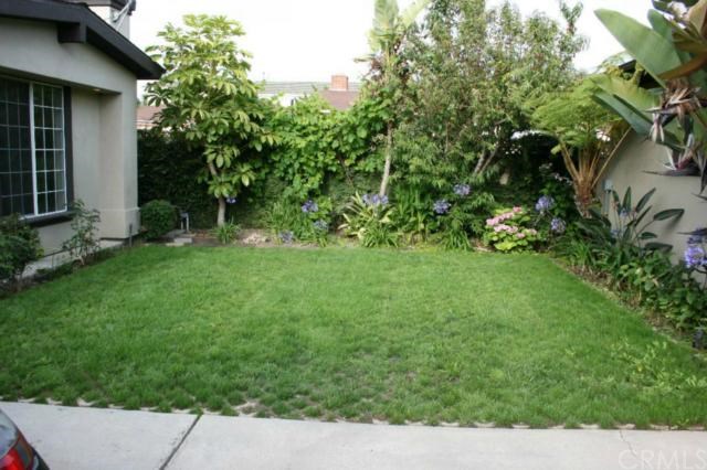 2213 Bataan Road, Unit A Redondo Beach, CA 90278 - Photo 13 of 38 Grass area between the two houses is for rear house only.