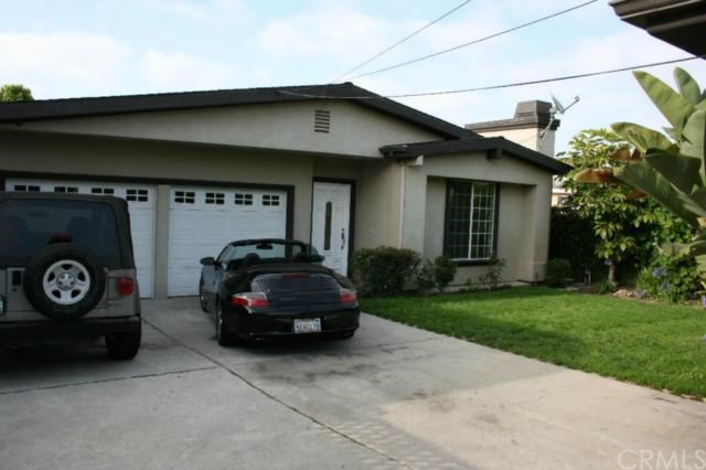 2213 Bataan Road, Unit A Redondo Beach, CA 90278 - Photo 16 of 38 REAR HOUSE. The garage on the left is for front house and the parking in front of it is for front house (where Jeep is parked. )