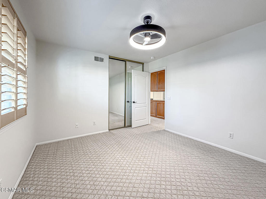 12057 Falcon Crest Way Porter Ranch, CA 91326 - Photo 36 of 86 a view of an empty room with a window