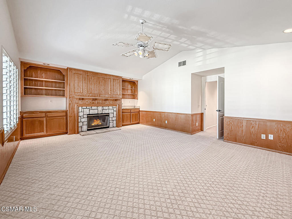 12057 Falcon Crest Way Porter Ranch, CA 91326 - Photo 38 of 86 a view of a livingroom with a fireplace