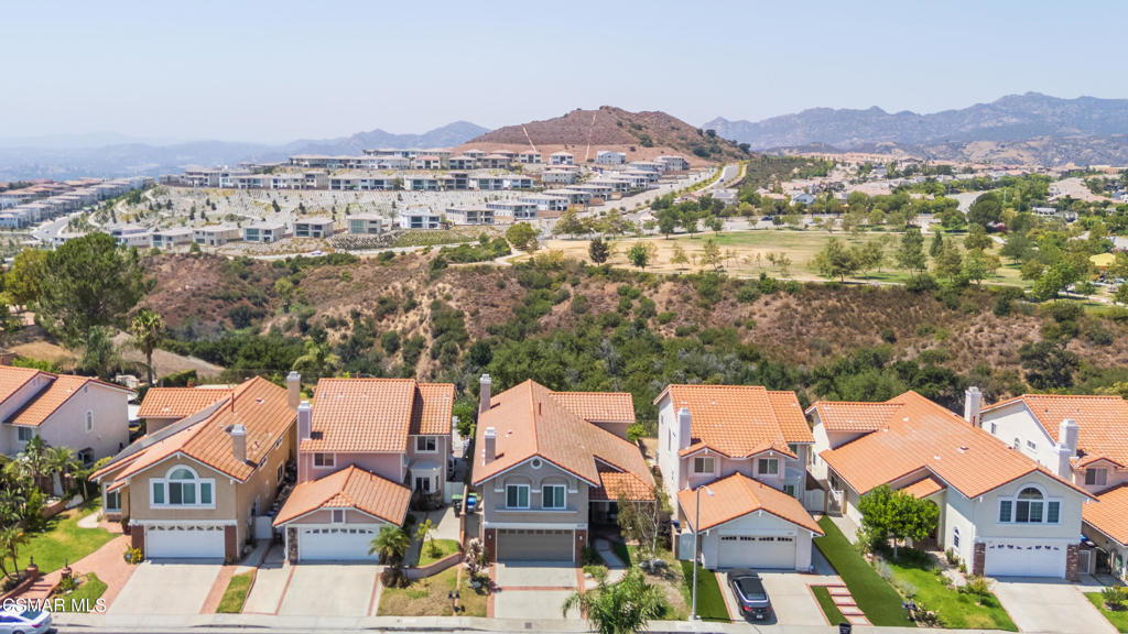 12057 Falcon Crest Way Porter Ranch, CA 91326 - Photo 75 of 86 an aerial view of residential houses and city view