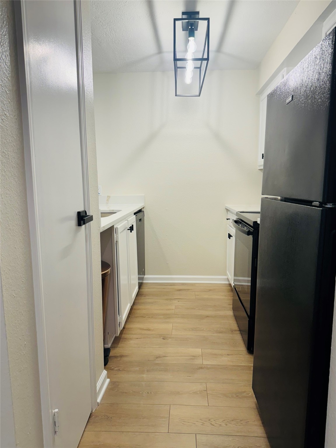 3900 Aspen Drive, Unit C104 Montgomery, TX 77356 - Photo 16 of 21 a view of a refrigerator in a kitchen