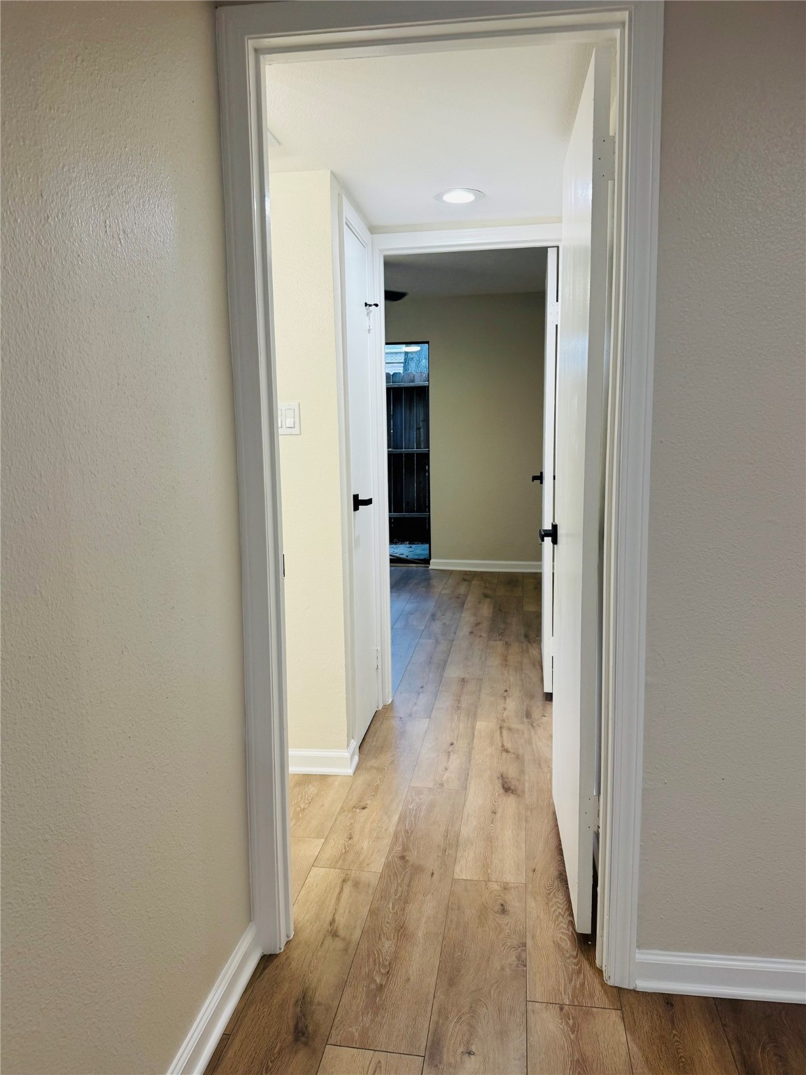 3900 Aspen Drive, Unit C104 Montgomery, TX 77356 - Photo 17 of 21 a view of a hallway with wooden floor and closet