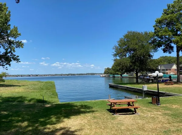 a small yard with lake view