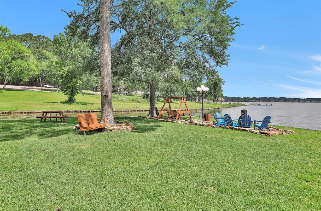 3900 Aspen Drive, Unit C104 Montgomery, TX 77356 - Photo 3 of 21 a view of a park with large trees