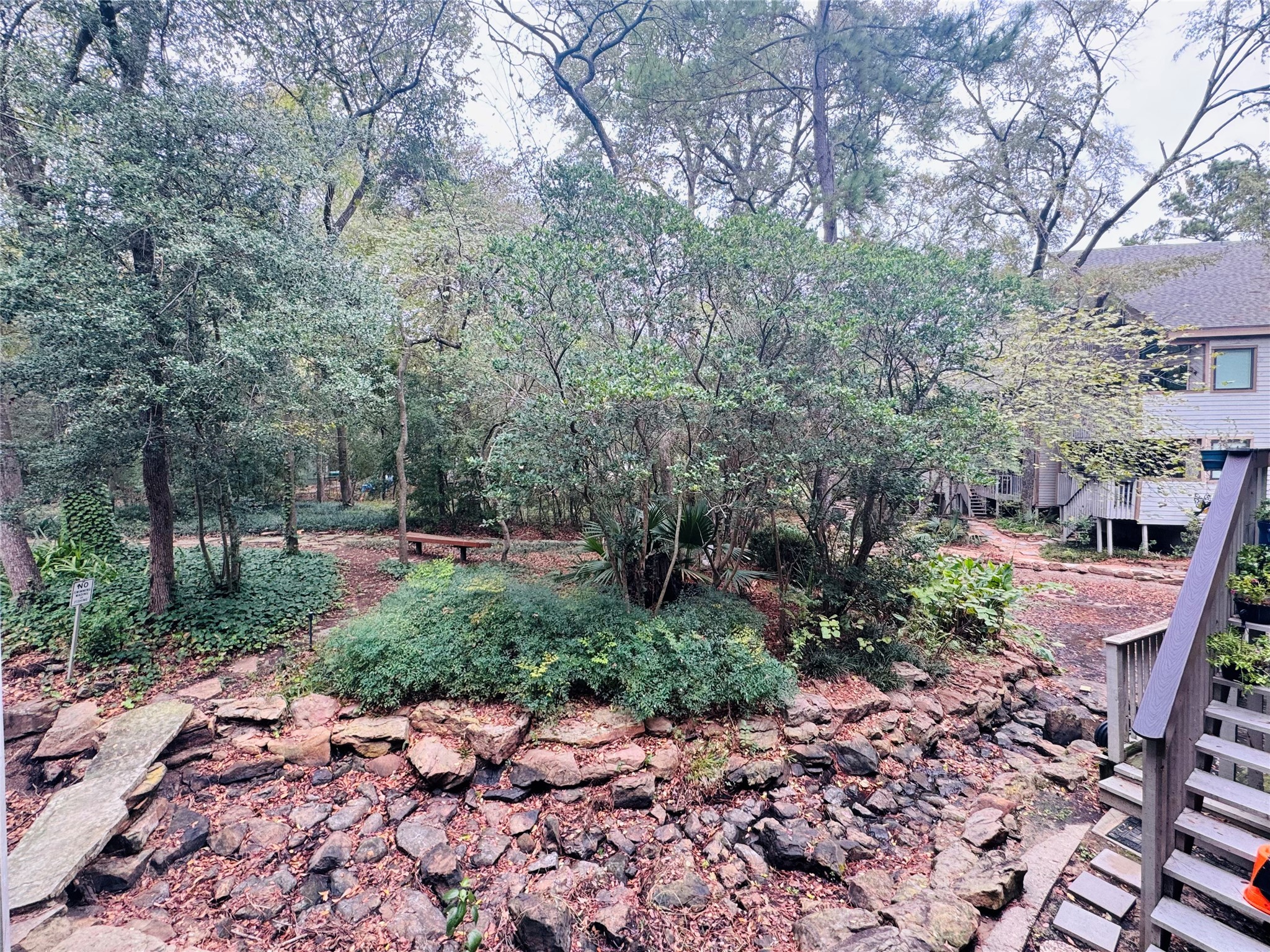 3900 Aspen Drive, Unit C104 Montgomery, TX 77356 - Photo 8 of 21 a view of a yard with plants and trees