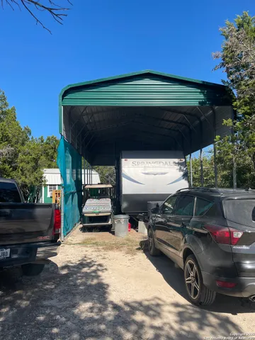 a view of outdoor space with porch and furniture