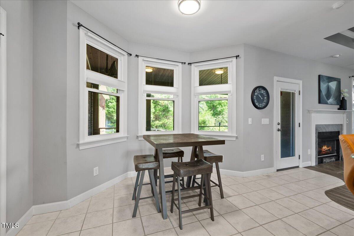 1005 Bellewood Farms Road Raleigh, NC 27603 - Photo 29 of 61 a dining room with furniture and window