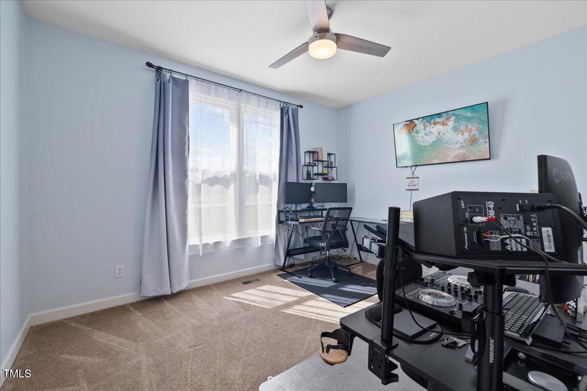 1005 Bellewood Farms Road Raleigh, NC 27603 - Photo 43 of 61 a workspace with furniture