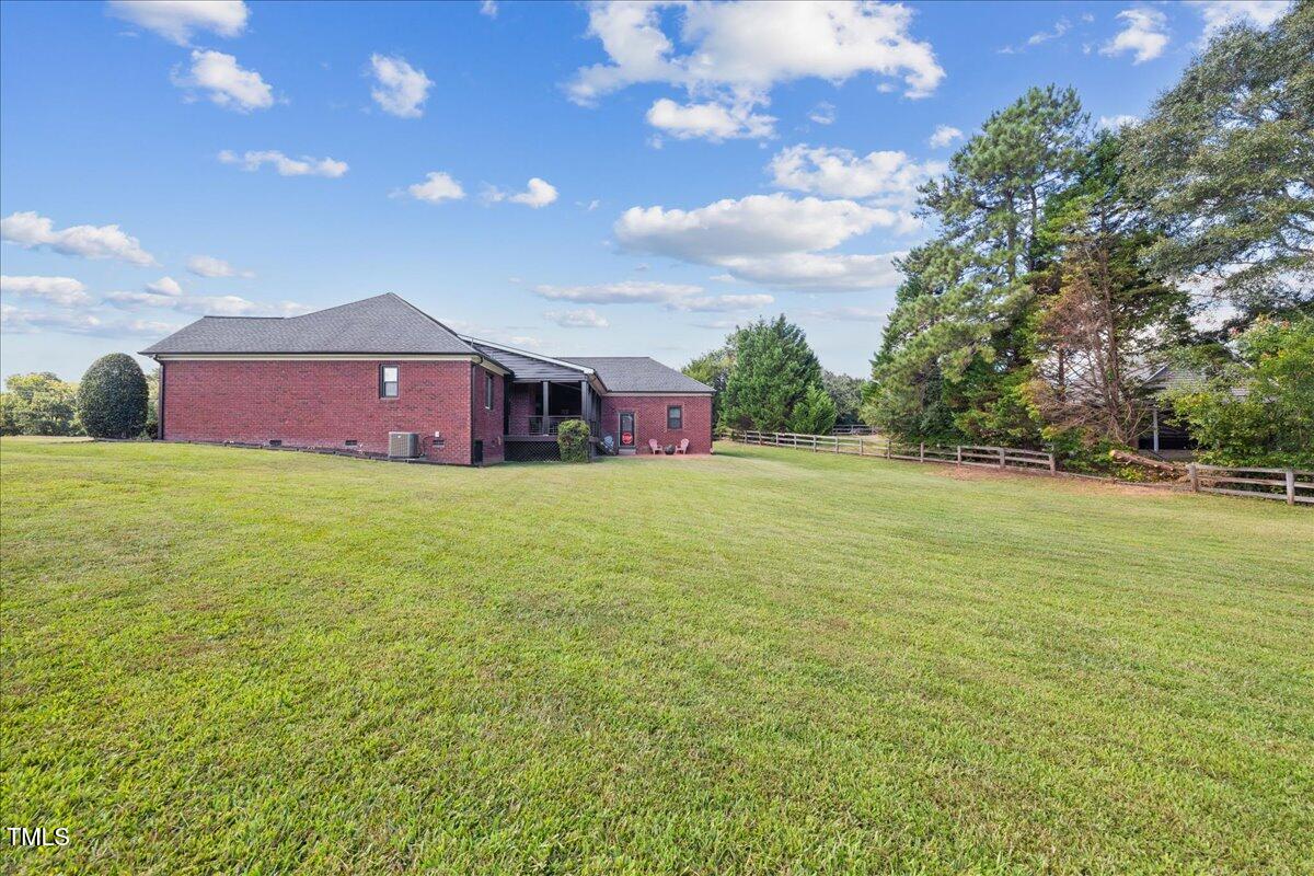 1005 Bellewood Farms Road Raleigh, NC 27603 - Photo 56 of 61 a view of a house with a big yard