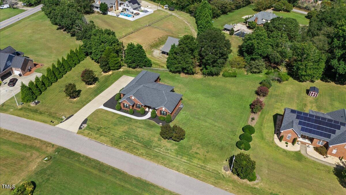 1005 Bellewood Farms Road Raleigh, NC 27603 - Photo 57 of 61 an aerial view of a house having yard