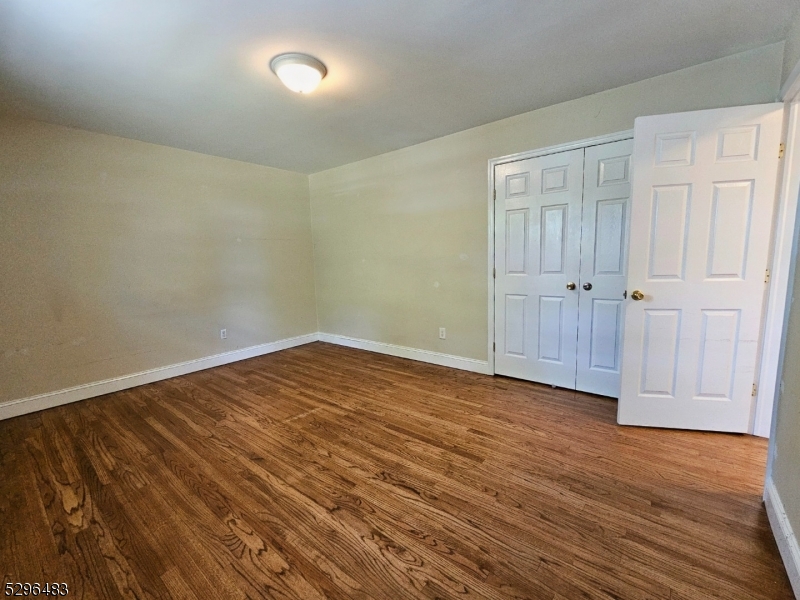 201 Vail Street, Unit 1B Hackettstown, NJ 07840 - Photo 11 of 12 wooden floor in an empty room