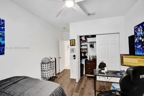 a view of a hallway with dining area