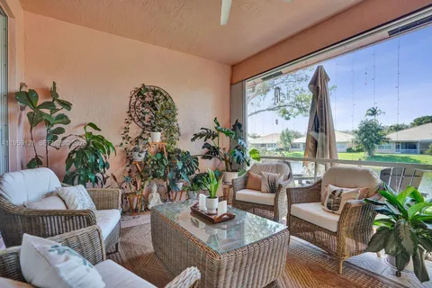 a view of a lake with a house in the background