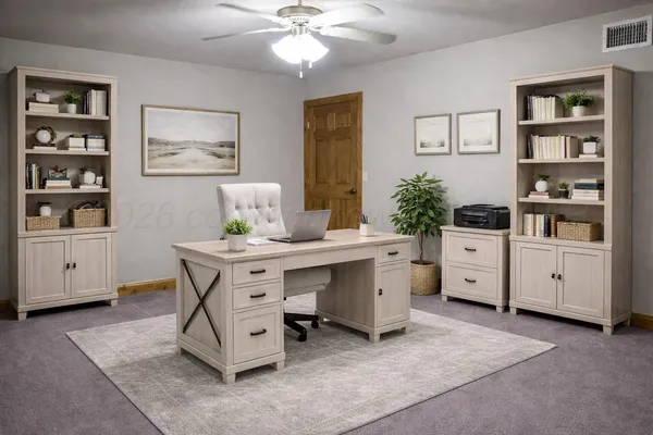 a living room with furniture and floor to ceiling window