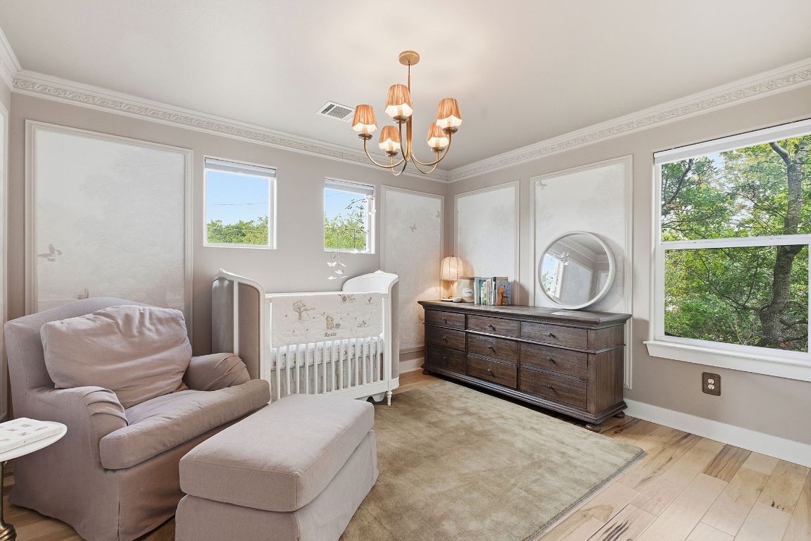 10012 Janet Loop Dripping Springs, TX 78620 - Photo 20 of 38 a living room with furniture and a large window