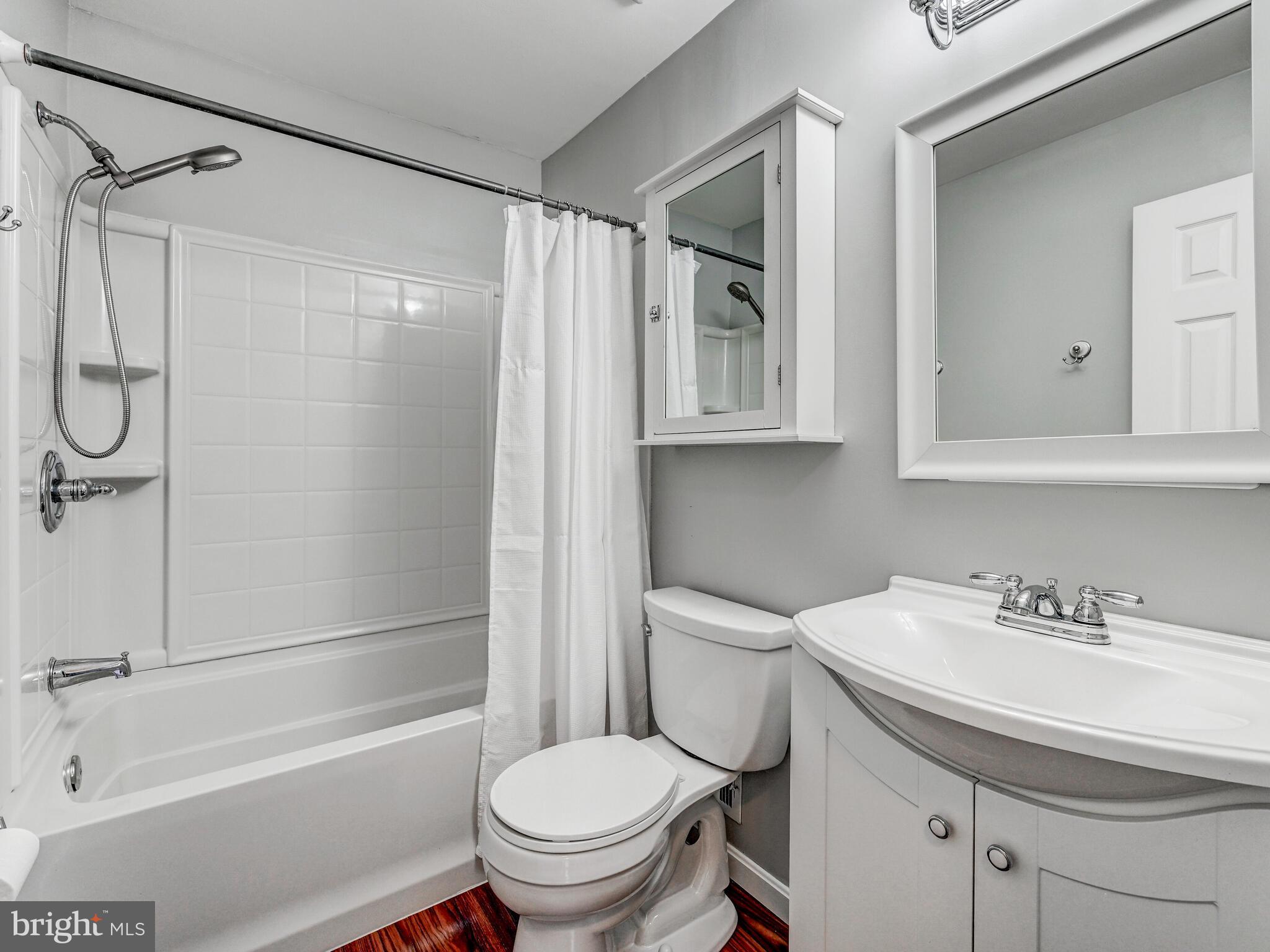 1679 Hart Court Crofton, MD 21114 - Photo 17 of 38 a bathroom with a sink toilet and shower