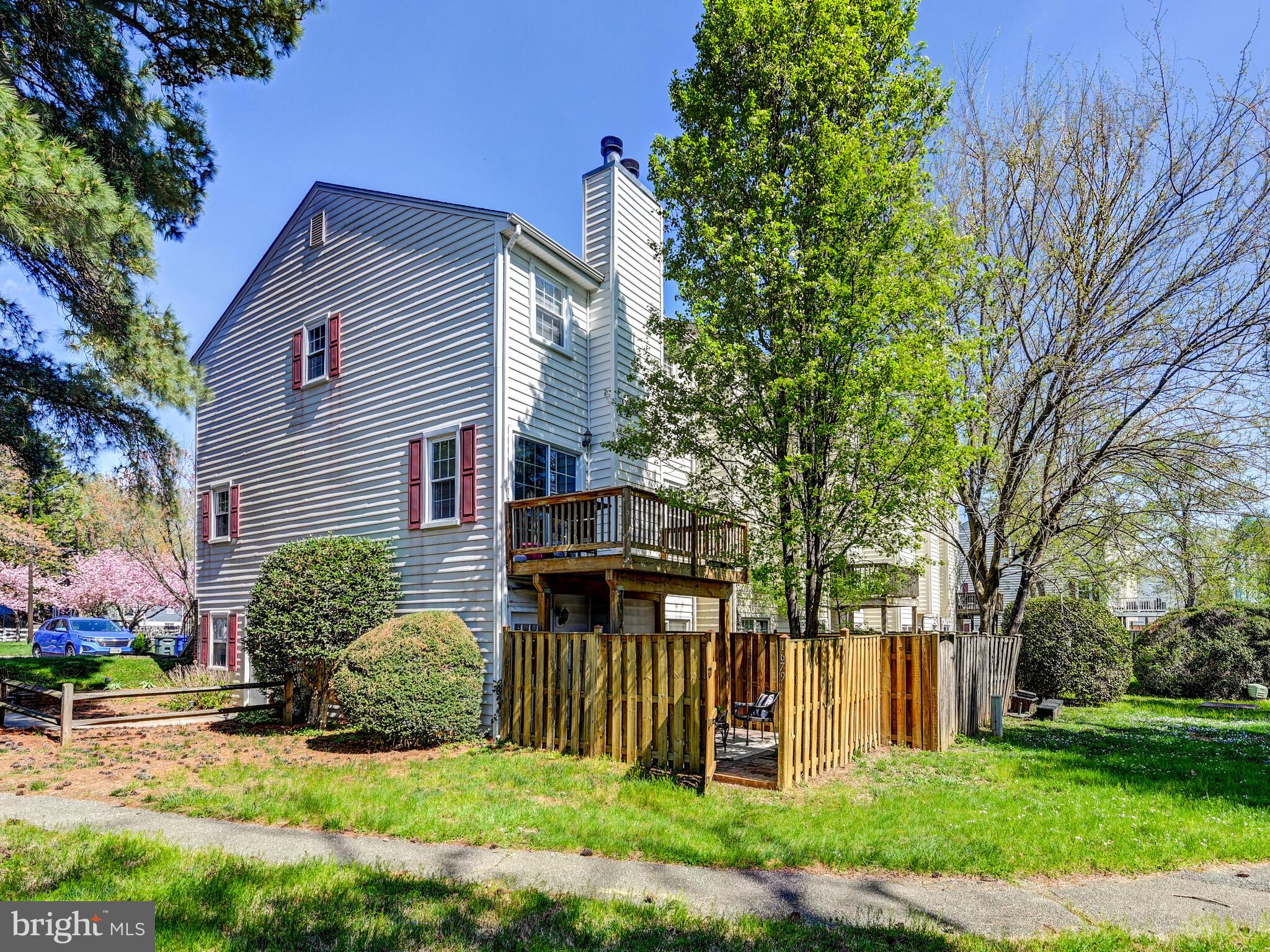 1679 Hart Court Crofton, MD 21114 - Photo 25 of 38 a front view of a house with a yard