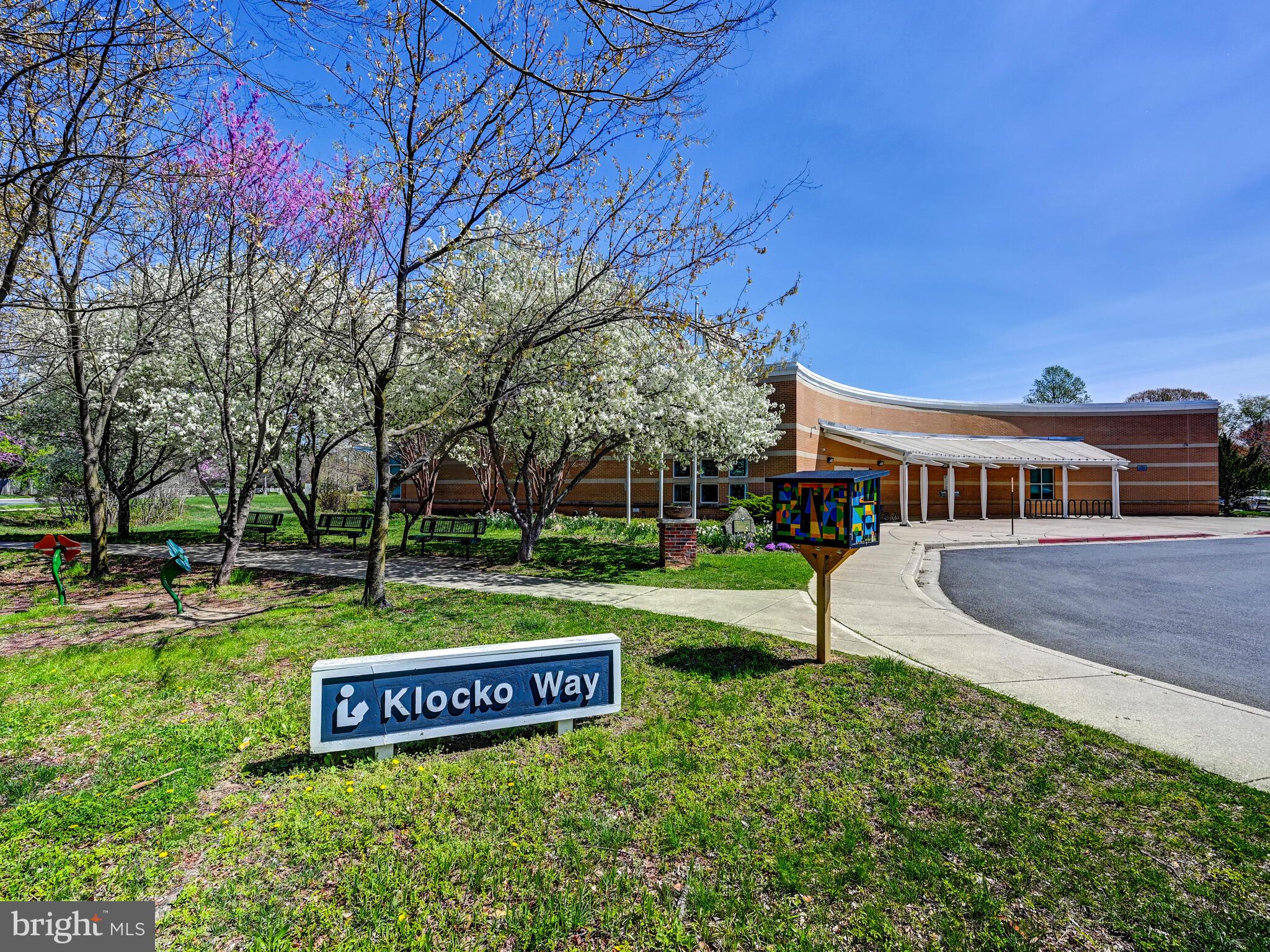 1679 Hart Court Crofton, MD 21114 - Photo 33 of 38 a view of a house with garden and a bench