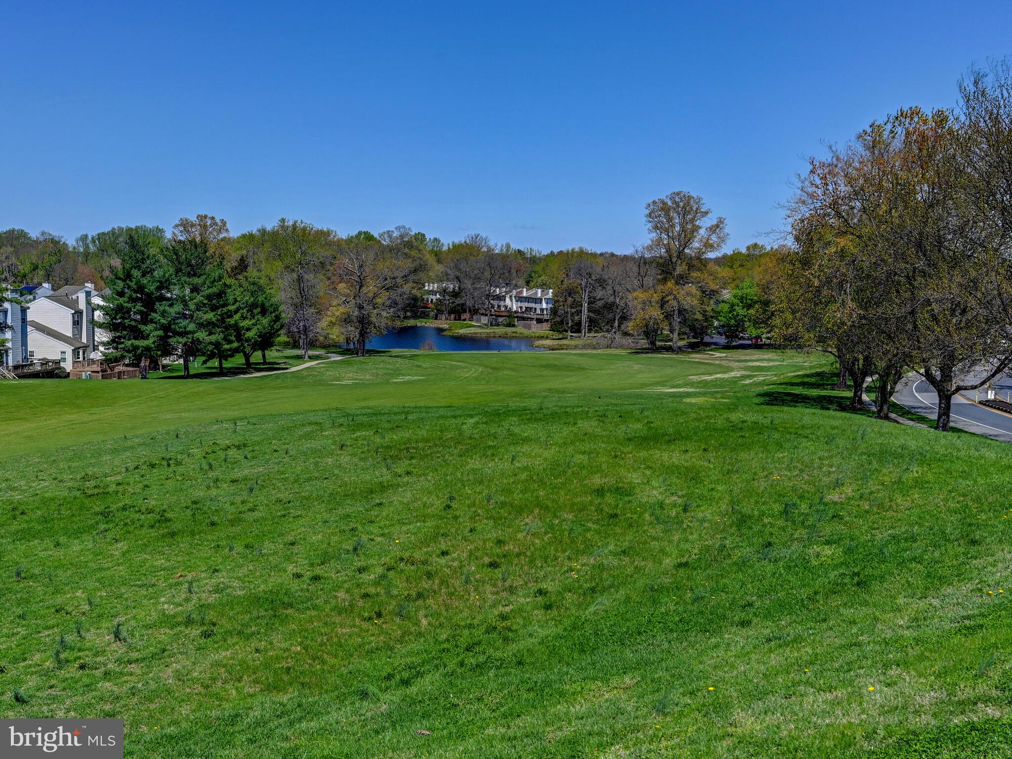1679 Hart Court Crofton, MD 21114 - Photo 37 of 38 a view of a grassy field with trees
