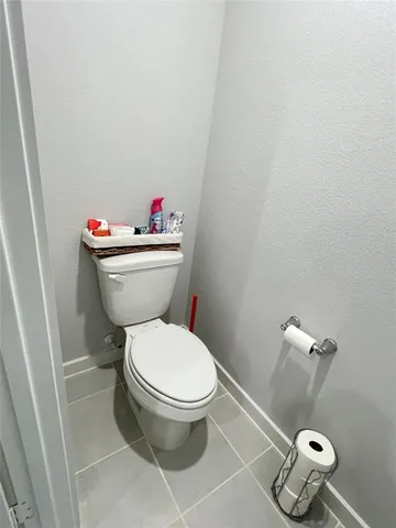 a bathroom with a double vanity sink mirror and shower