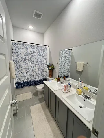 a bedroom with a workspace