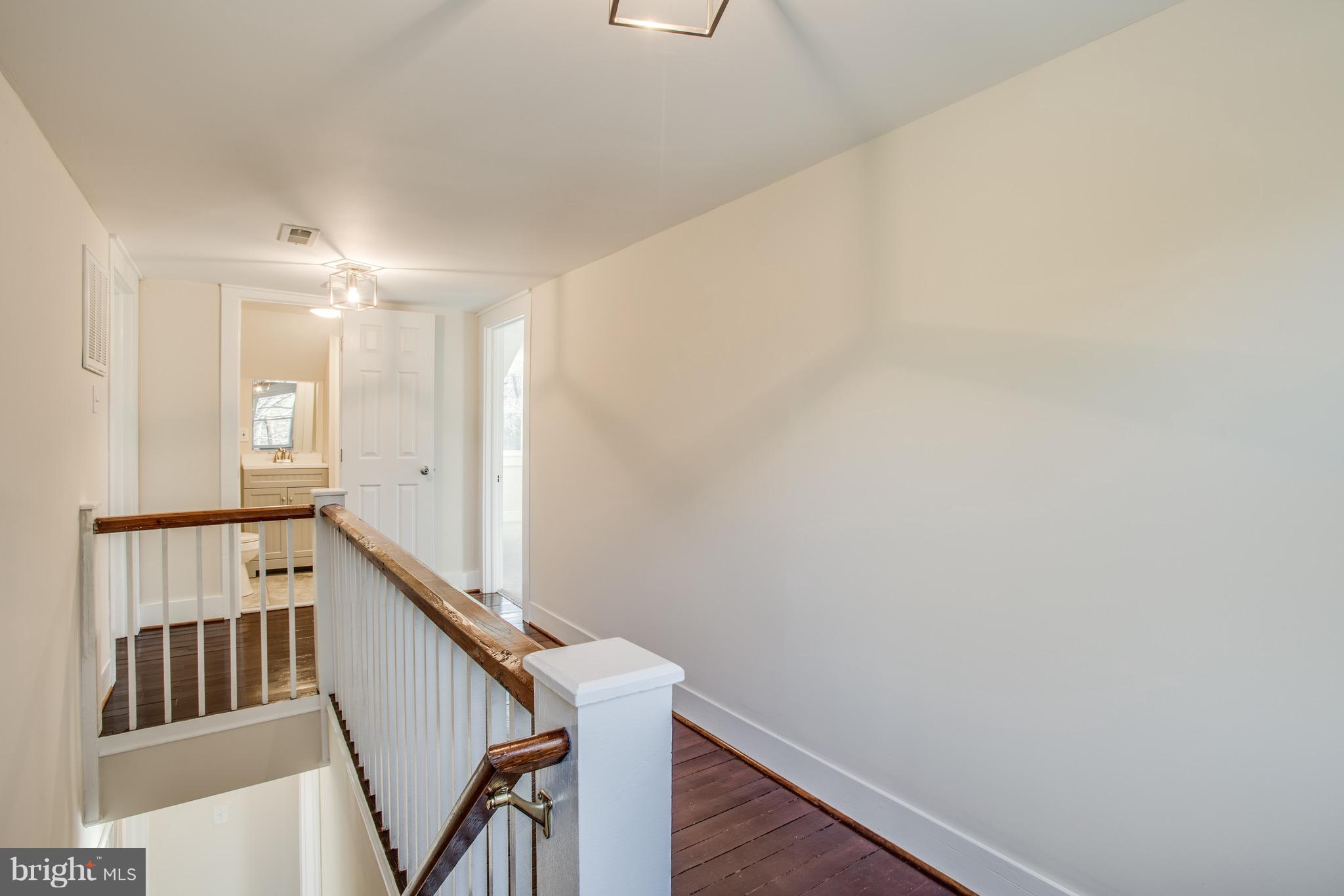 7530 Courthouse Road Spotsylvania, VA 22551 - Photo 16 of 37 Upstairs Hallway with original Pine floors
