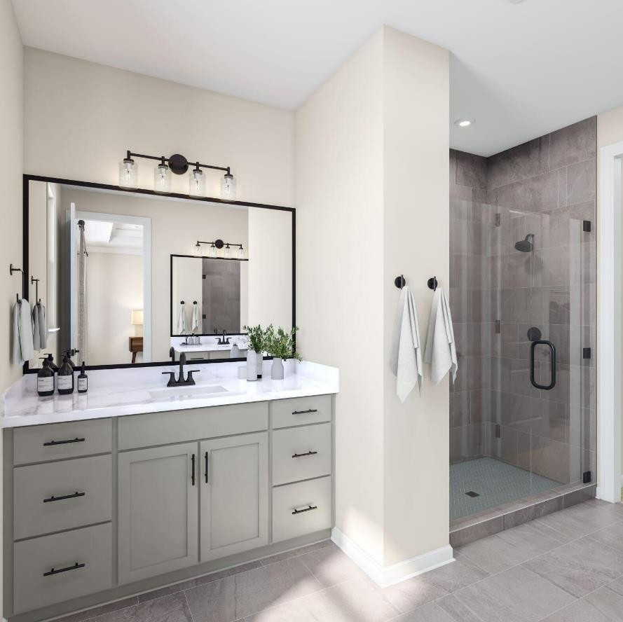 7812 Sofiana Avenue Raleigh, NC 27617 - Photo 13 of 13 a bathroom with a double vanity sink mirror and shower