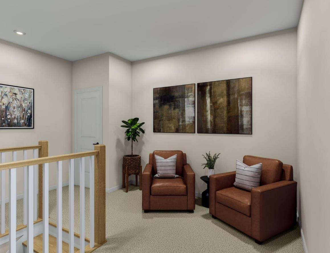 7812 Sofiana Avenue Raleigh, NC 27617 - Photo 10 of 13 a living room with furniture and a couch