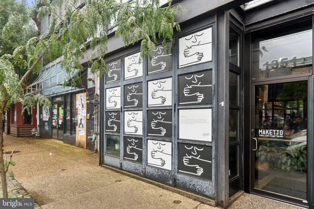 a view of a brick building with a large window