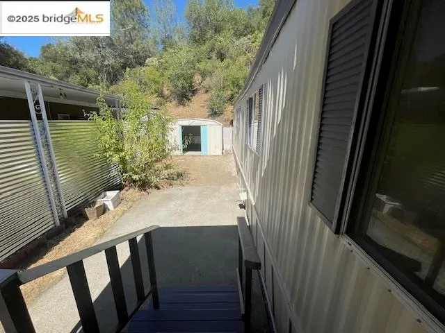 a view of balcony with furniture