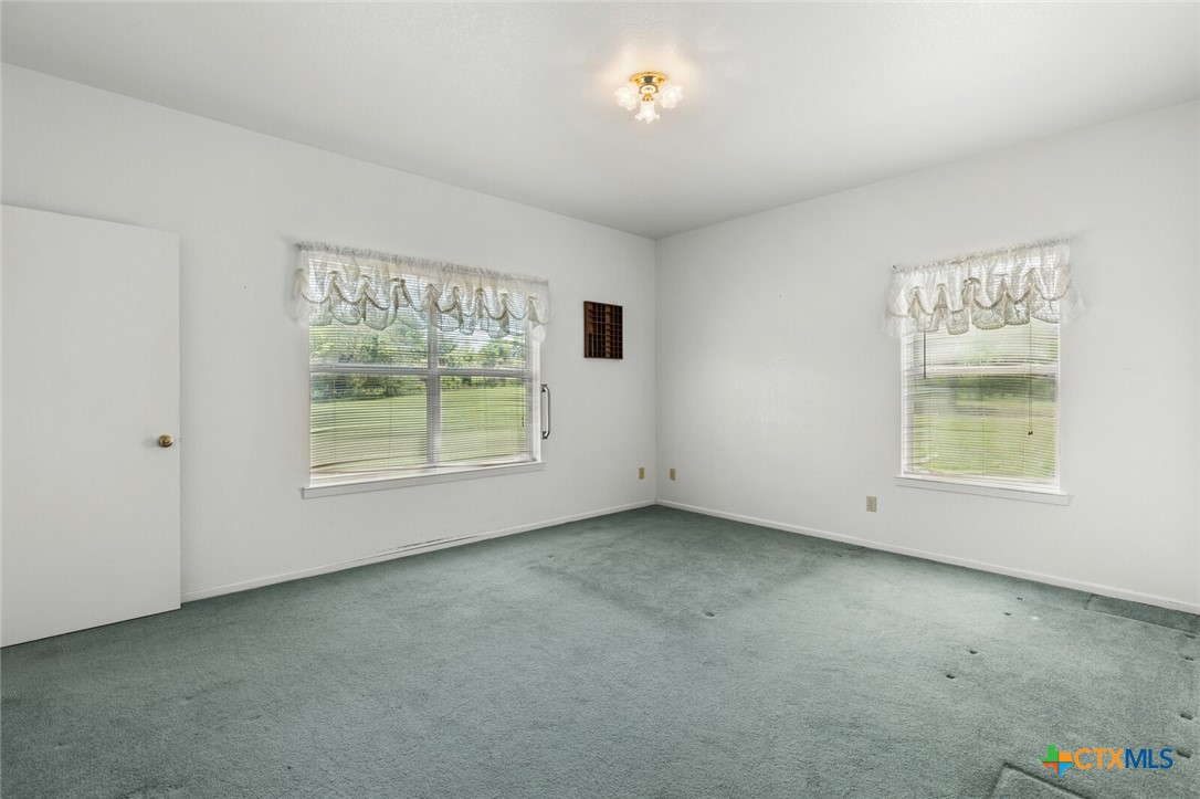 10514 Hunt Hill Road Rogers, TX 76569 - Photo 36 of 46 an empty room with a window