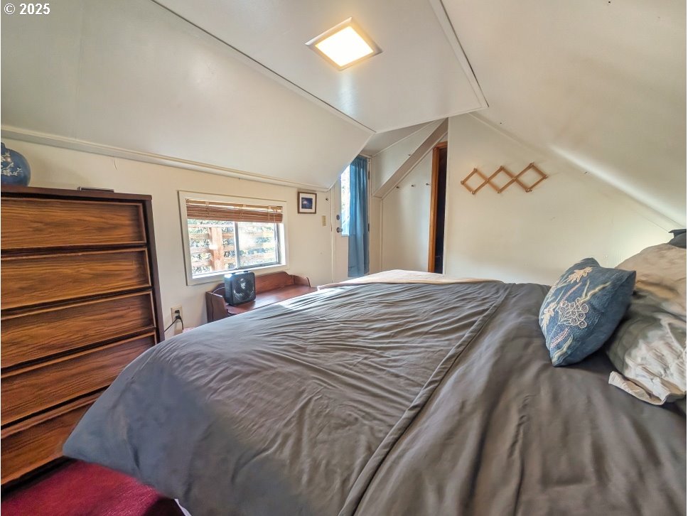 89255 Government Camp Loop Government Camp, OR 97028 - Photo 17 of 37 a bed sitting in a bedroom next to a window