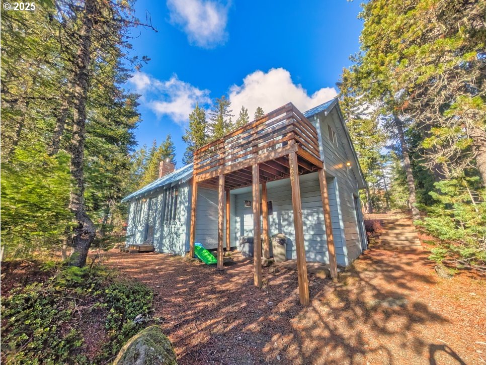 89255 Government Camp Loop Government Camp, OR 97028 - Photo 35 of 37 a front view of a house with garden