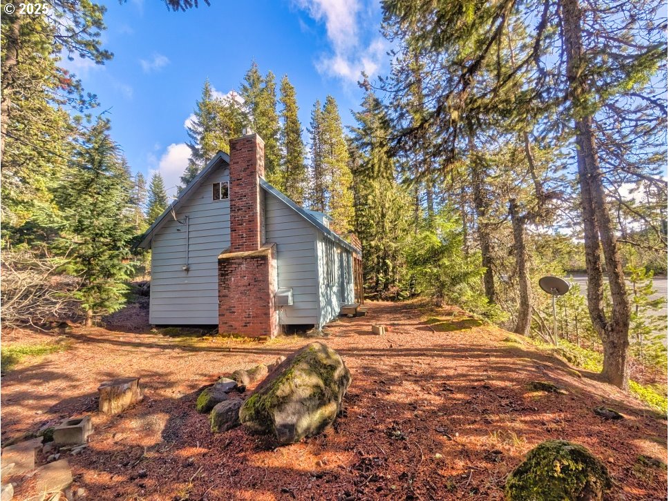 89255 Government Camp Loop Government Camp, OR 97028 - Photo 36 of 37 a view of a house with a yard