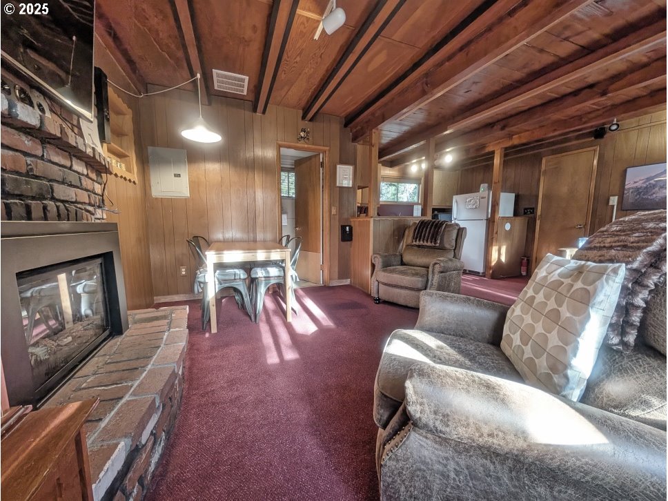 89255 Government Camp Loop Government Camp, OR 97028 - Photo 8 of 37 a living room with furniture and a fireplace