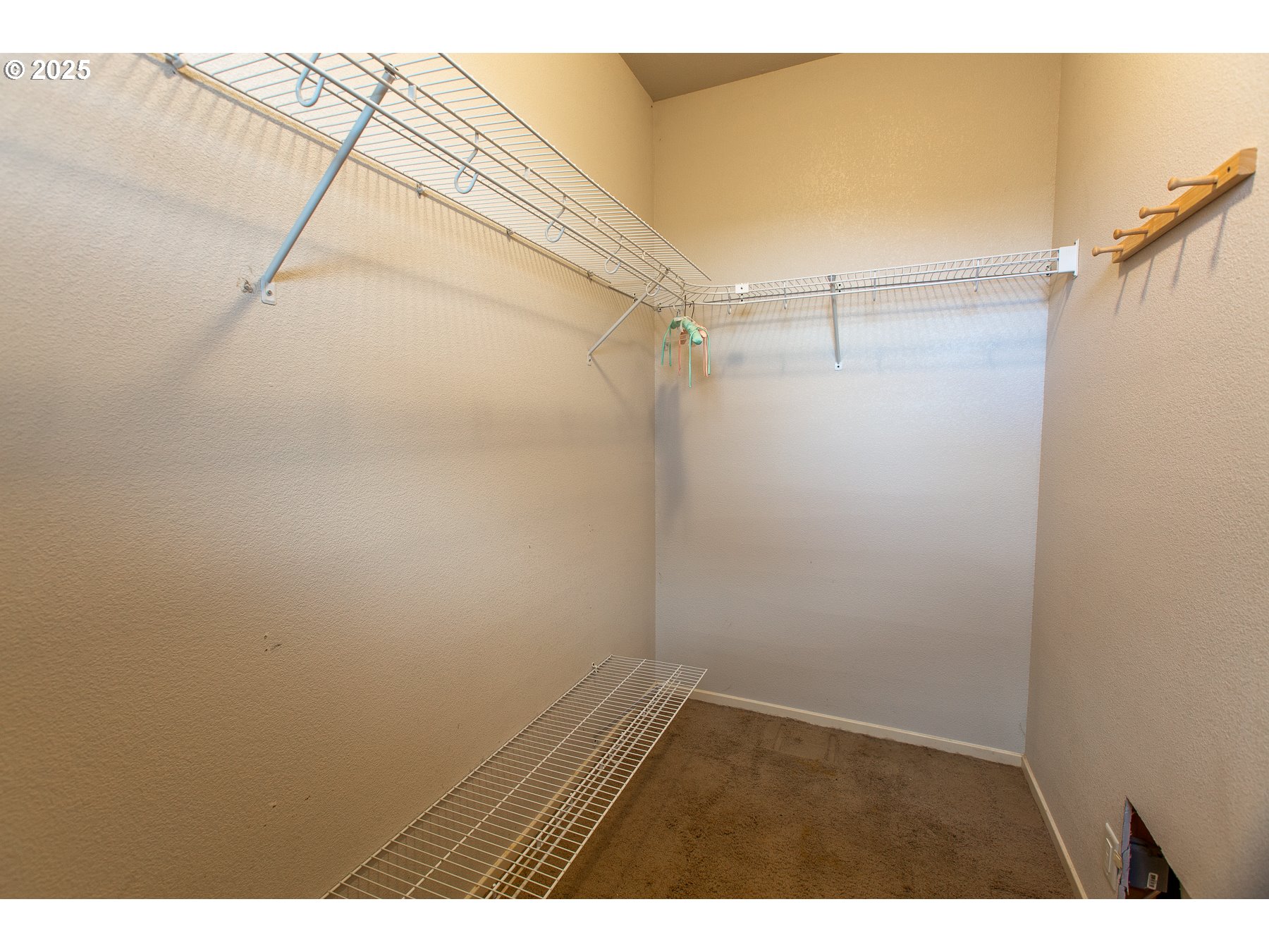 6964 Bluebelle Way Springfield, OR 97478 - Photo 21 of 35 a view of an empty walk in closet