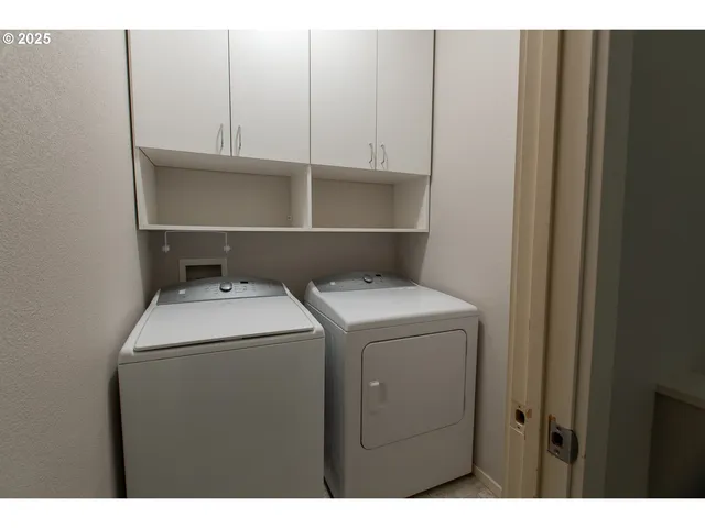 a view of a storage area with racks on the wall