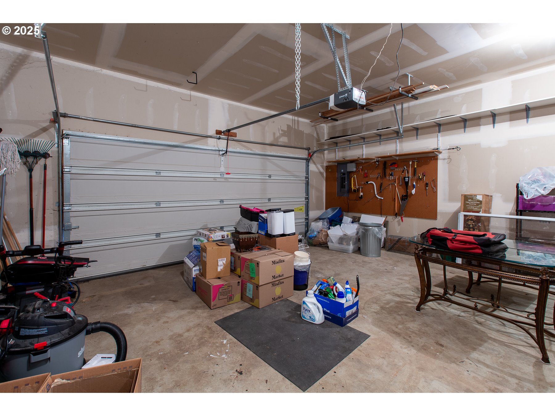 6964 Bluebelle Way Springfield, OR 97478 - Photo 28 of 35 a view of a storage area with racks on the wall